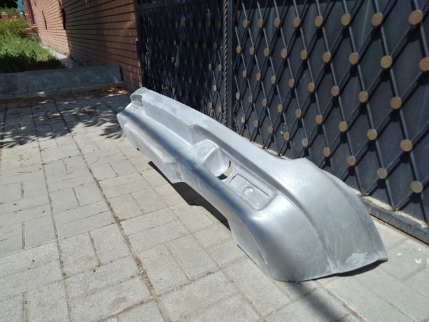 Силовой задний бампер стеклопластиковый для Chevrolet Niv@ купить недорого с доставкой в Пятигорск